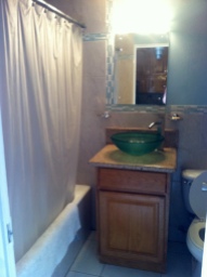 The bathroom is quite small but nicely updated